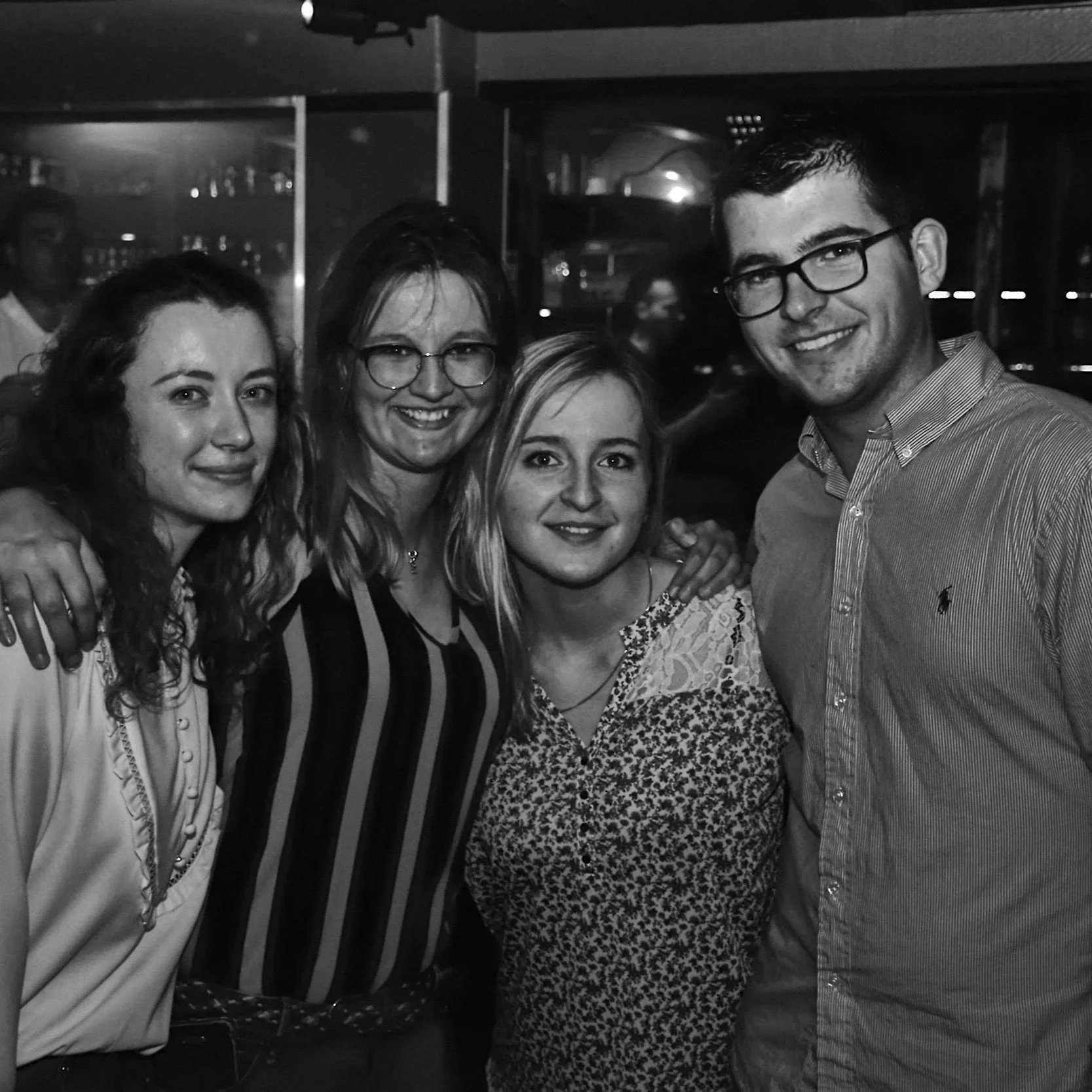 Geometric drawing of an outline square with sections divided by vertical, horizontal, and circle lines.