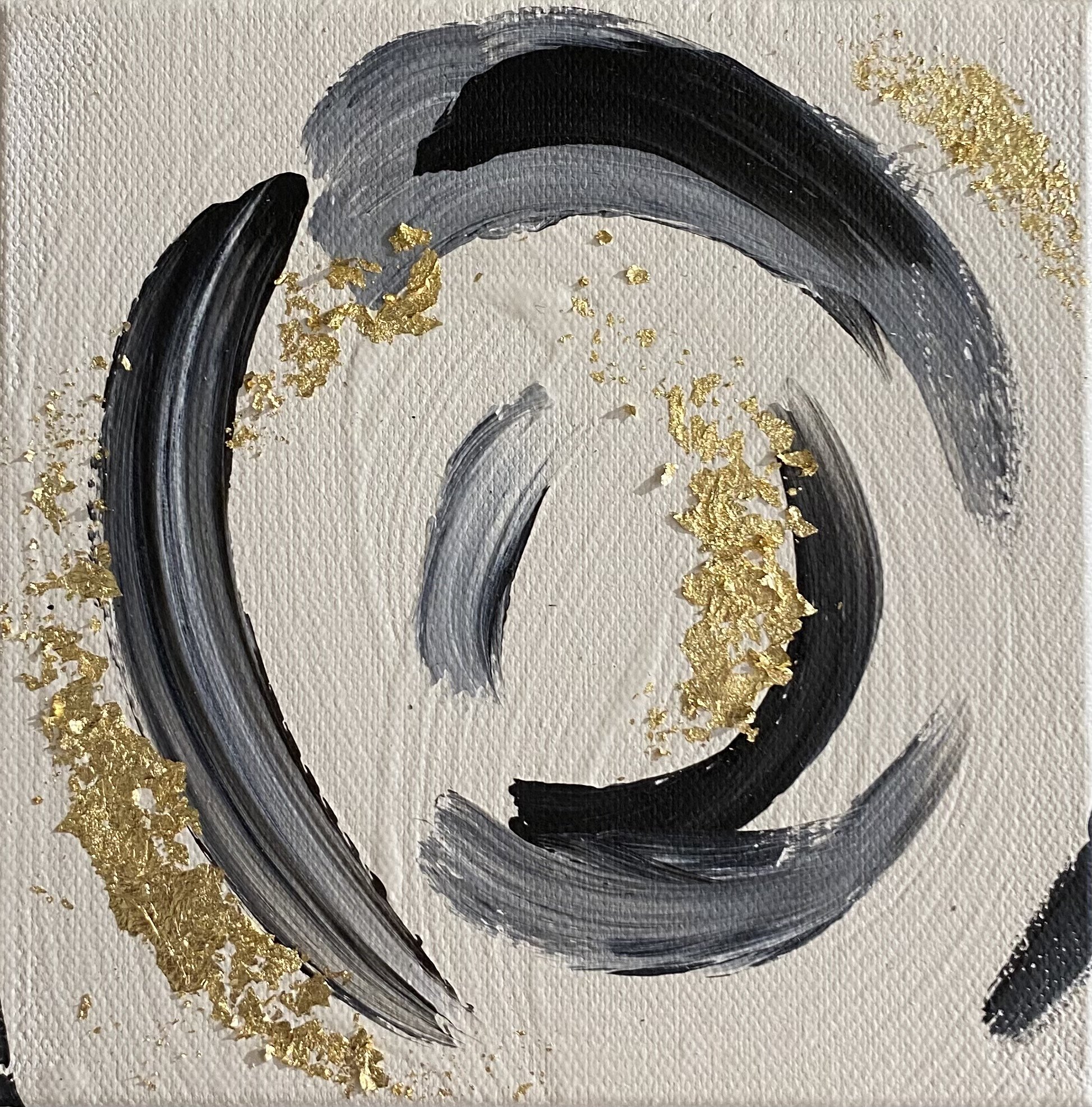 Abstract painting featuring black and gray brushstrokes with gold leaf accents on a white canvas.