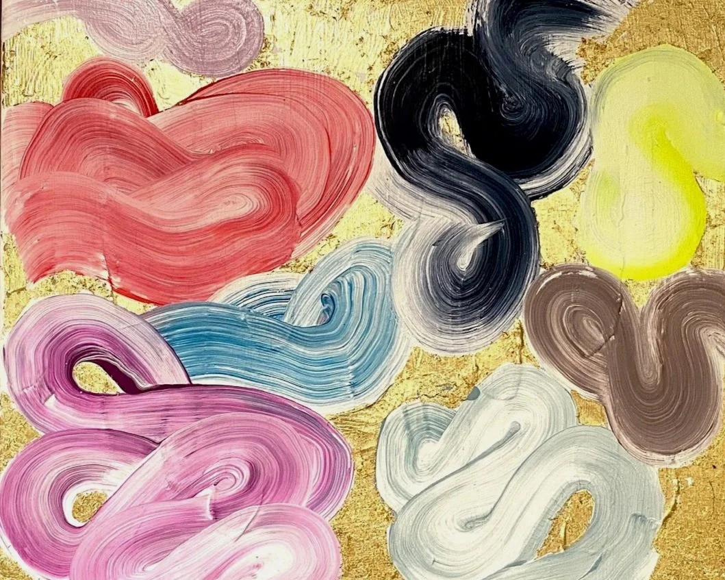 Abstract painting with colorful swirling brushstrokes on a gold background.