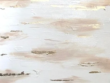 Abstract painting with beige, white, and gold brush strokes creating a textured, cloudy appearance.
