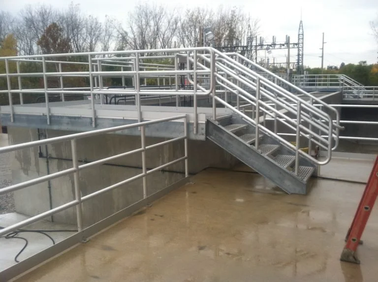 Industrial steel stairs and handrail system fabricated for a water treatment facility.