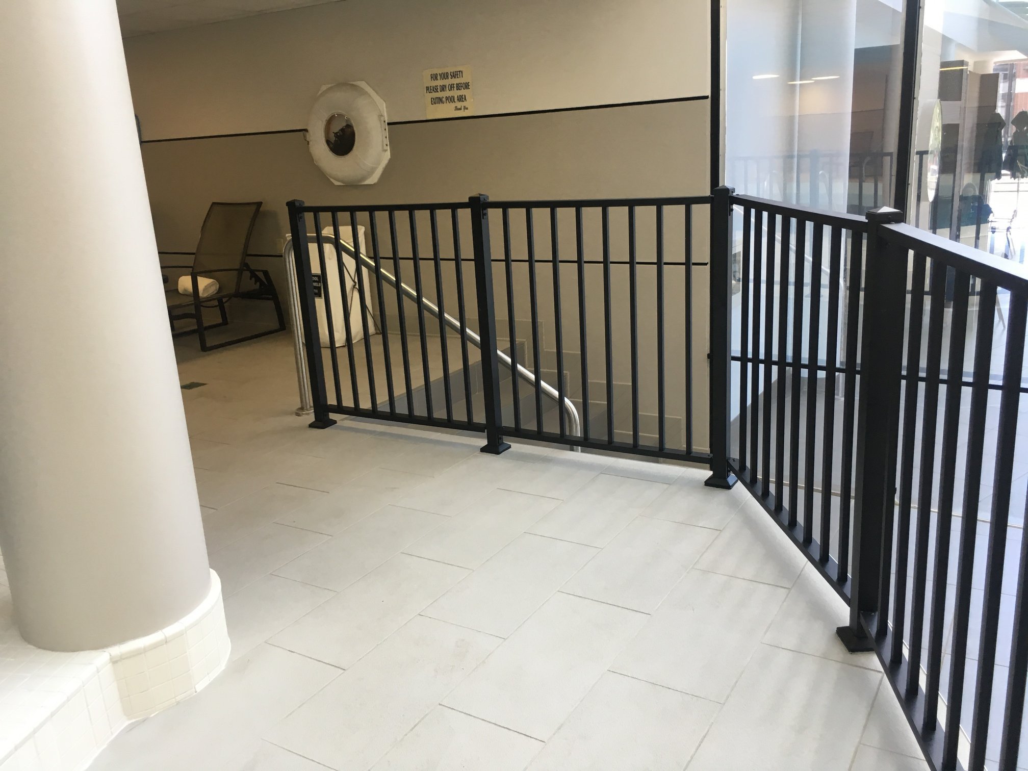 Interior Steel Guardrails Fabricated to Provide Fall Protection Along the Pool and Seating Areas.