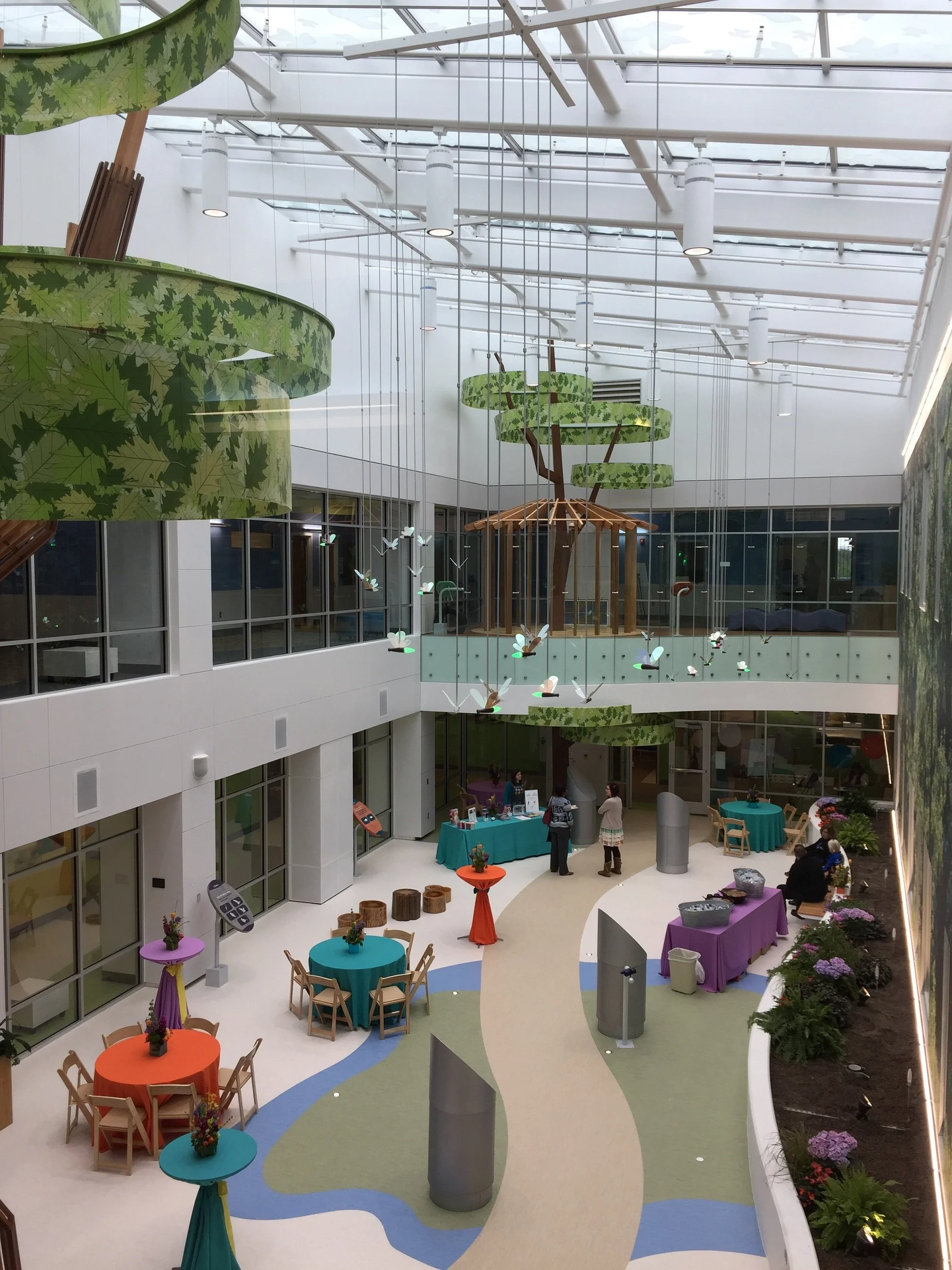 Custom ornamental metal installation fabricated for a healthcare facility interior.