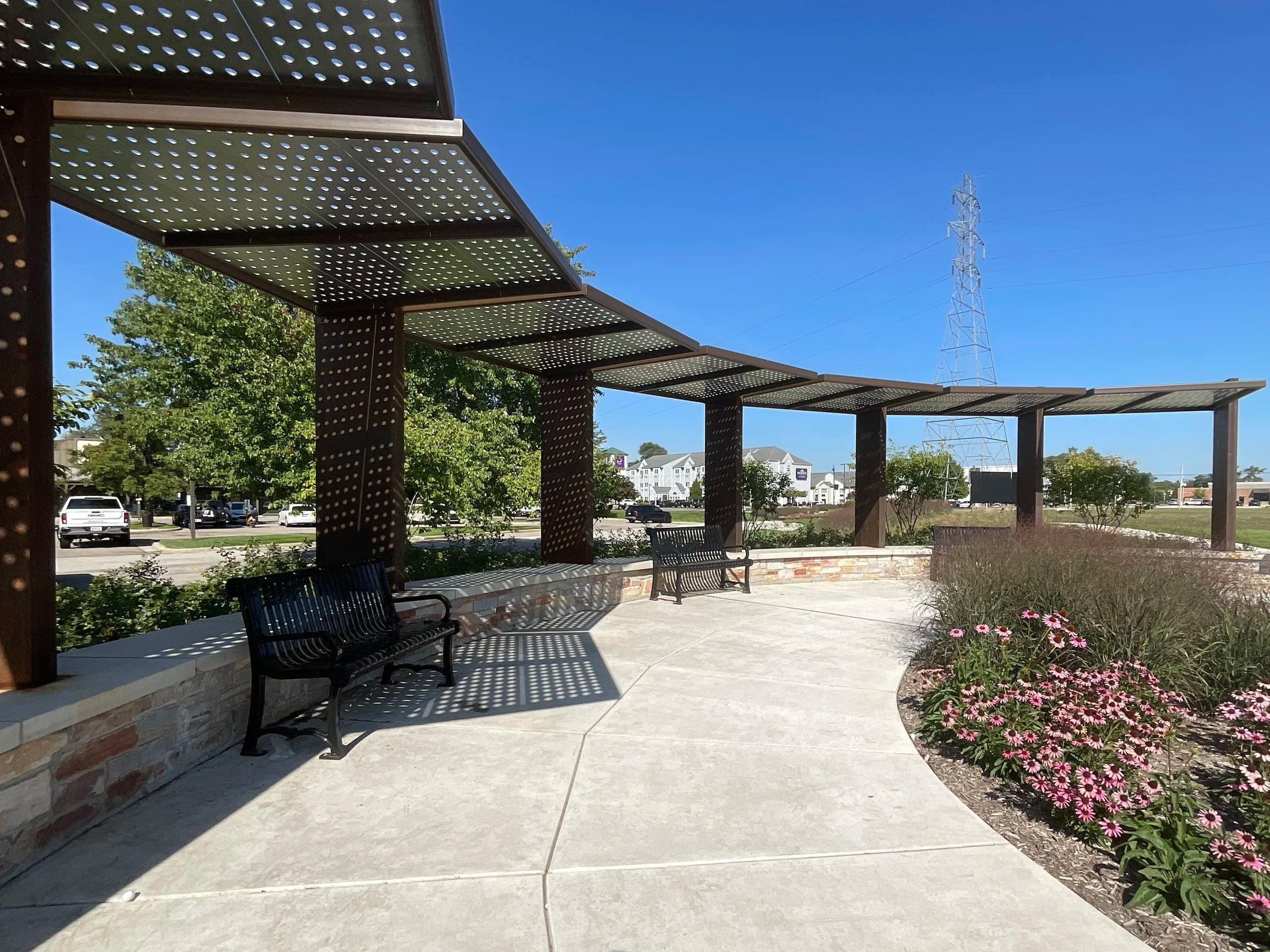Steel Shade Structures Fabricated to Support Covered Pedestrian Circulation.