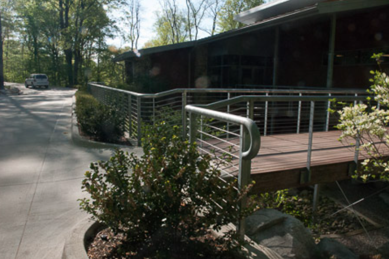 Exterior Ramp and Cable Railing System Providing Accessible Circulation Between Campus Buildings.