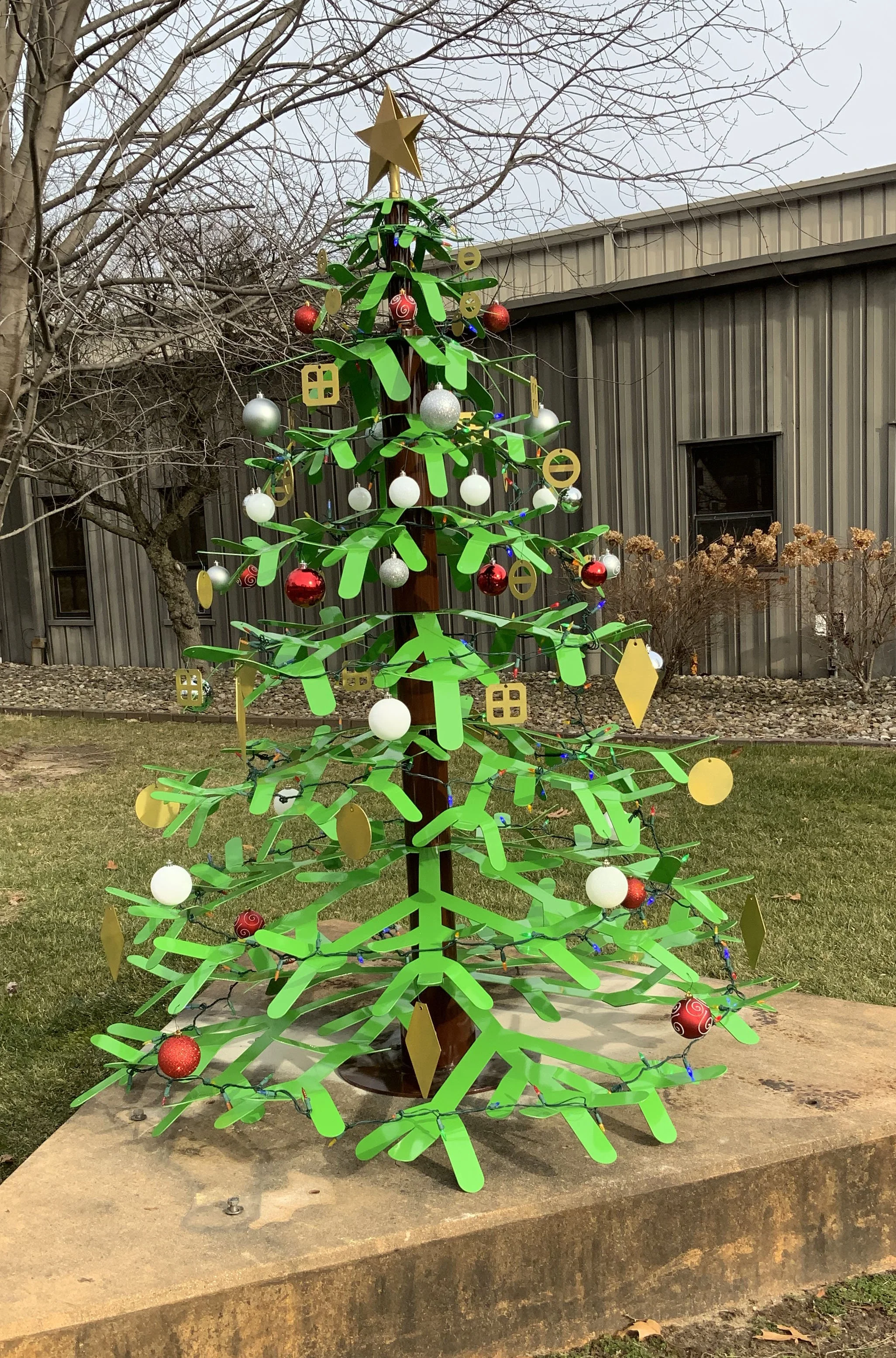 Custom metal holiday display fabricated for seasonal installation.