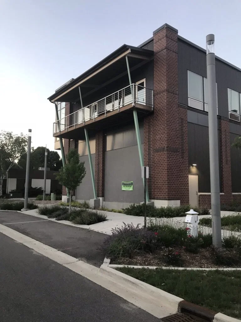 Exterior Steel Balcony Railings and Angled Support Framing Fabricated for Moso Village Apartments.