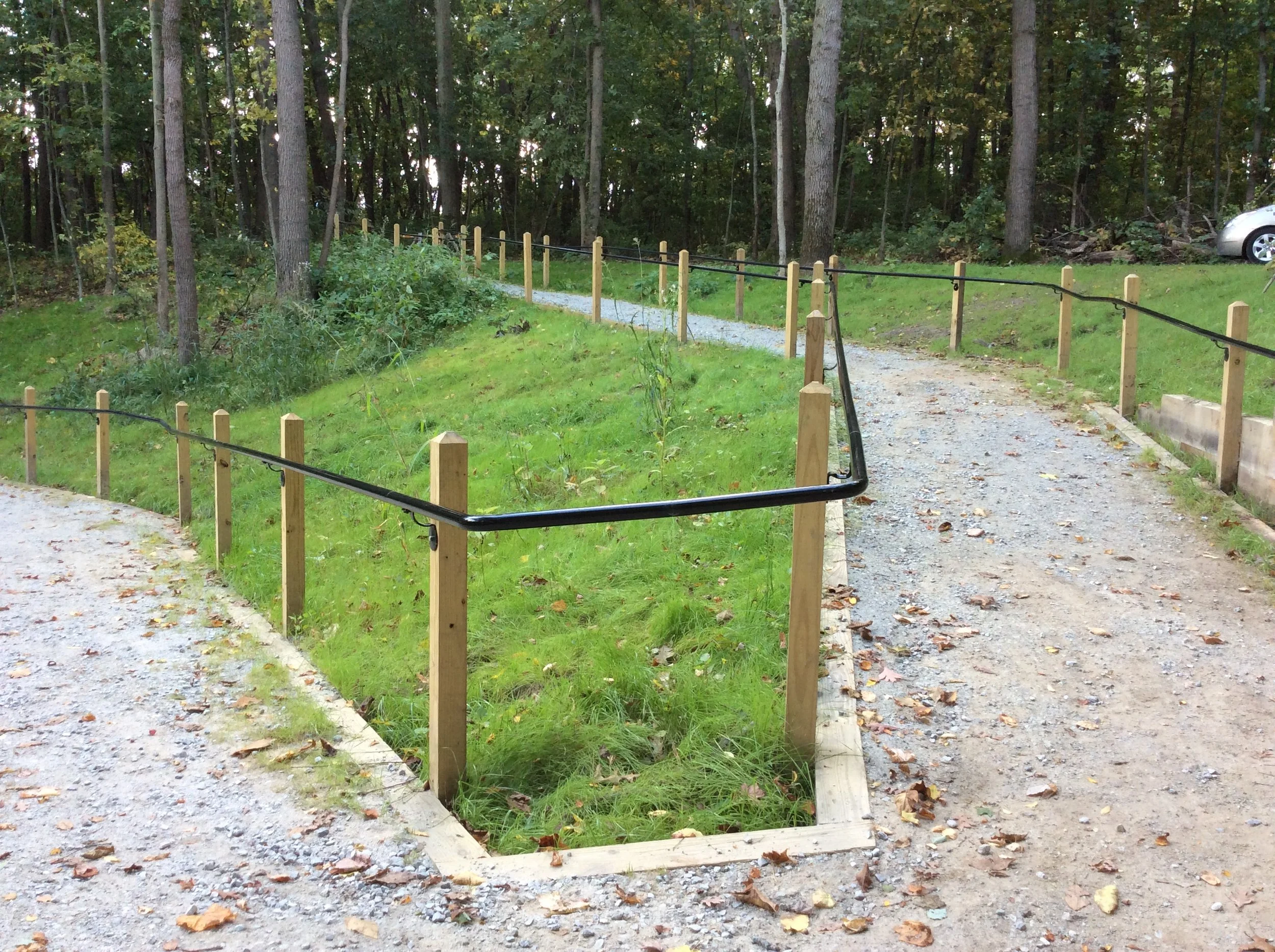 Steel Handrail System Fabricated for Sloped Walking Trails within the Children's Garden Landscape.
