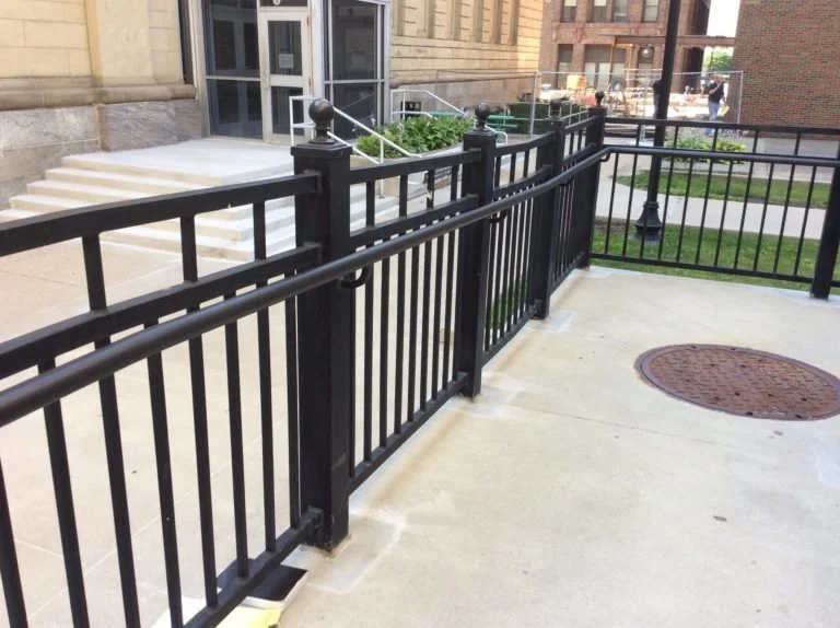 Guardrail System Fabricated to Support Adjacent Circulation Around the Courthouse.