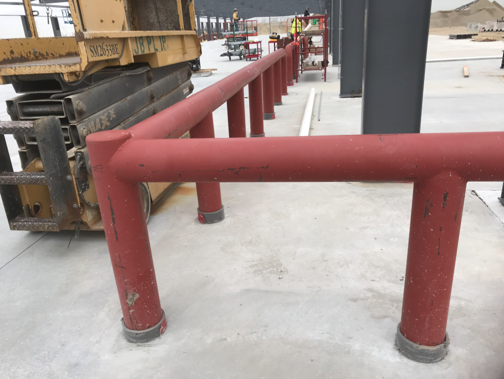 Fabricated steel safety barriers used for equipment and work zone protection.
