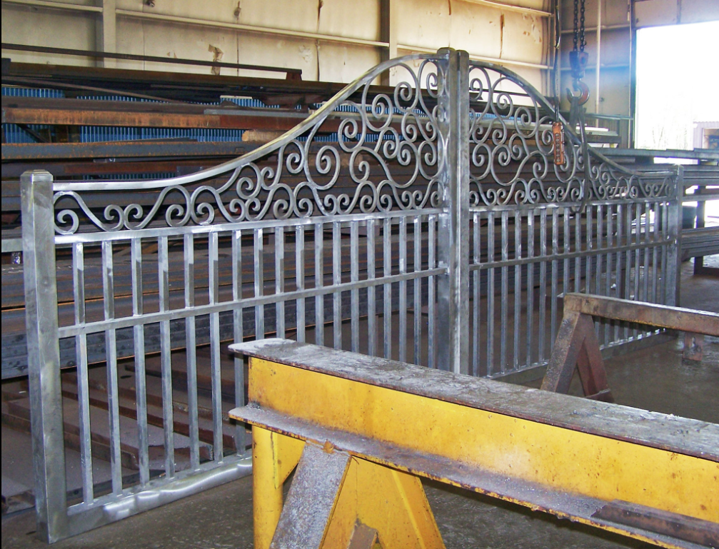 Custom ornamental metal gate fabricated in shop prior to installation.