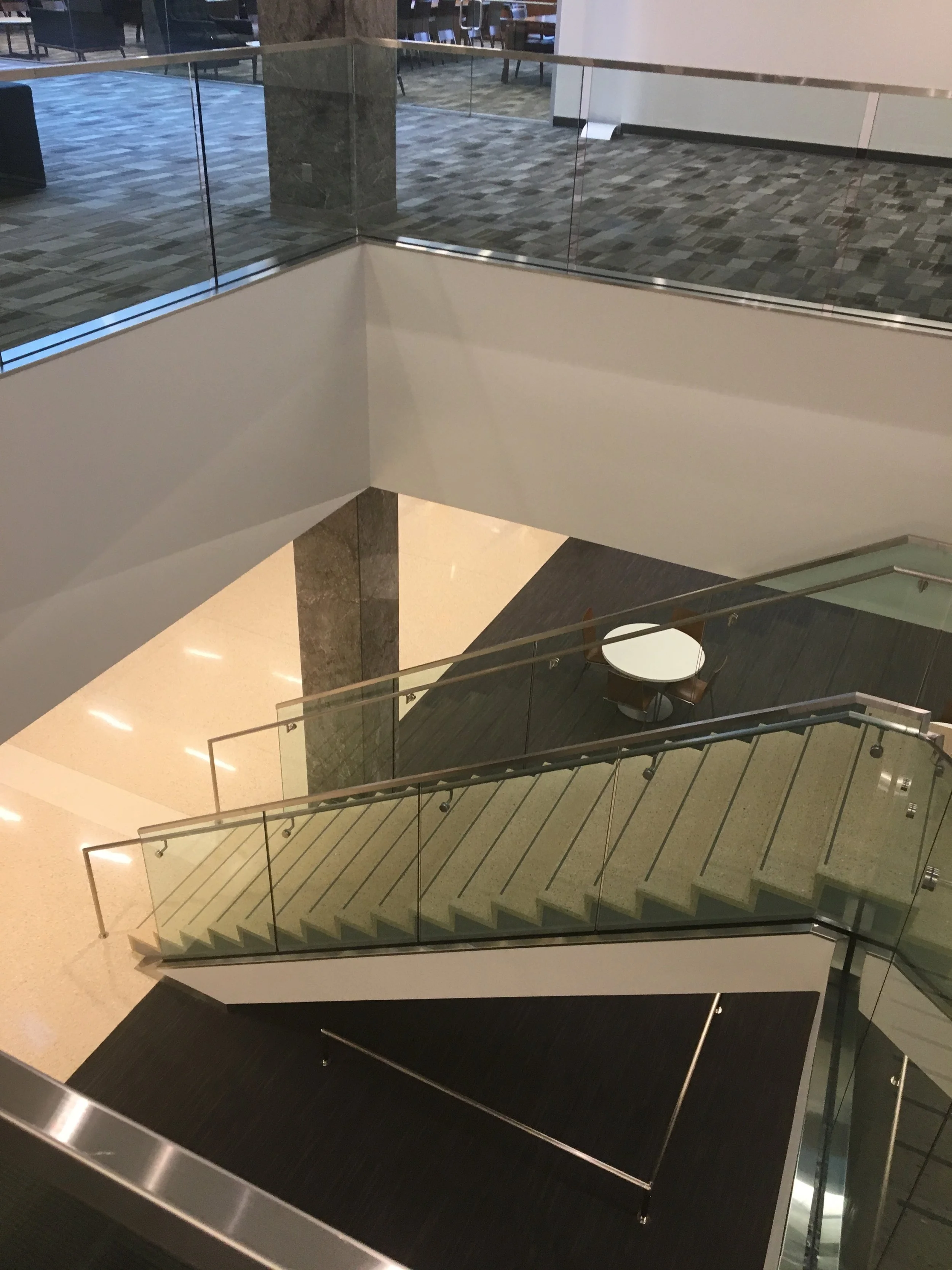 Custom Glass Guardrails Providing Safe Access Between Public Study and Collaboration Spaces.