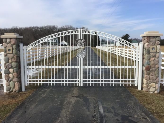 Custom fabricated residential entry gate installed at private property.