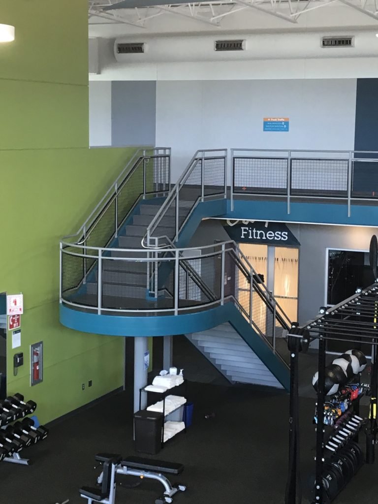 Interior metal stairs and railing system fabricated for a Beacon Health Center facility.