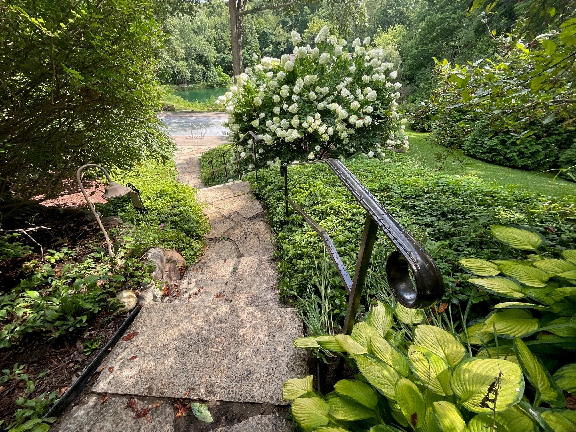 Custom Ornamental Handrail for Stone Garden Path.