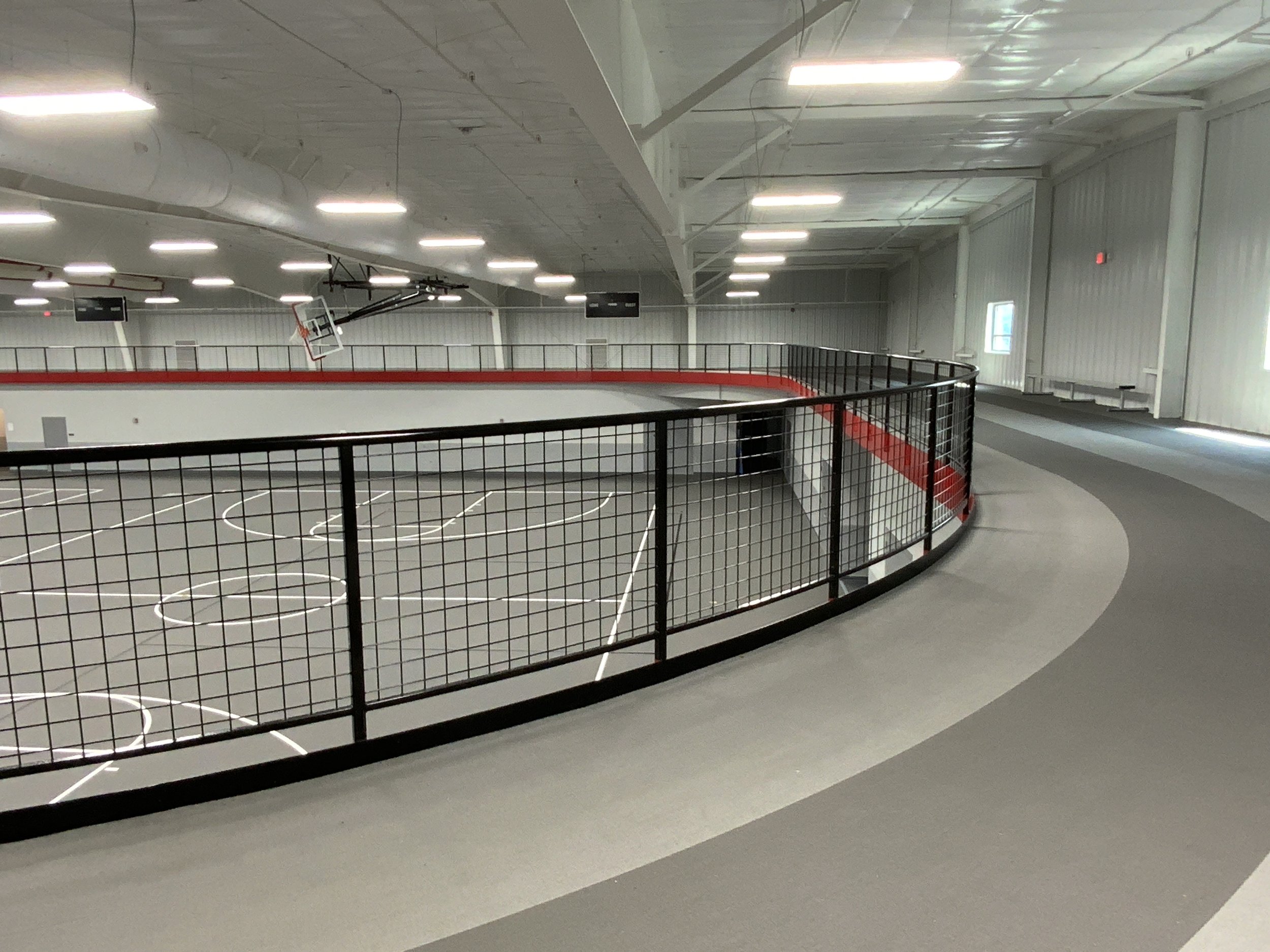 Interior guardrail system fabricated for indoor athletic facility.