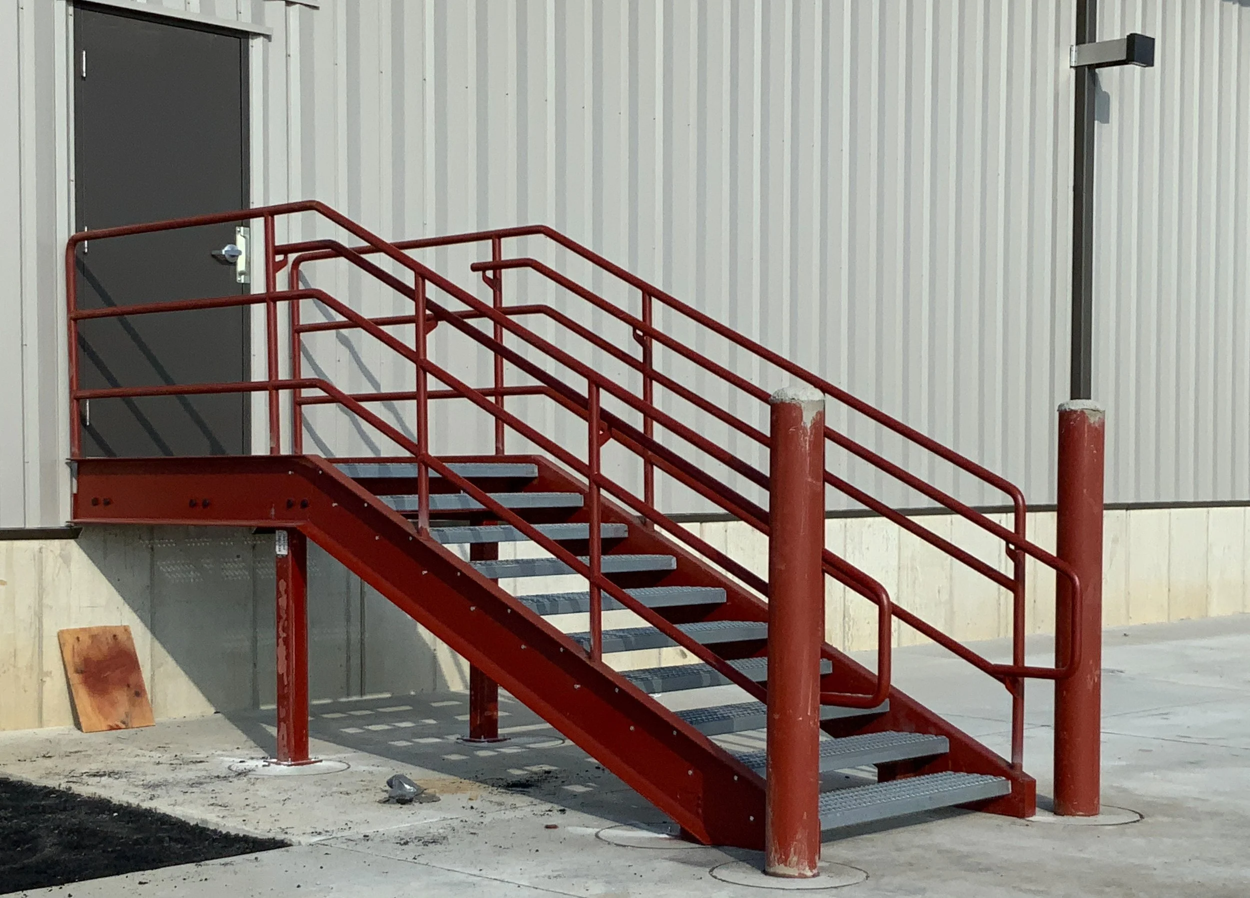 Exterior industrial steel stair with guardrail system fabricated for facility access.