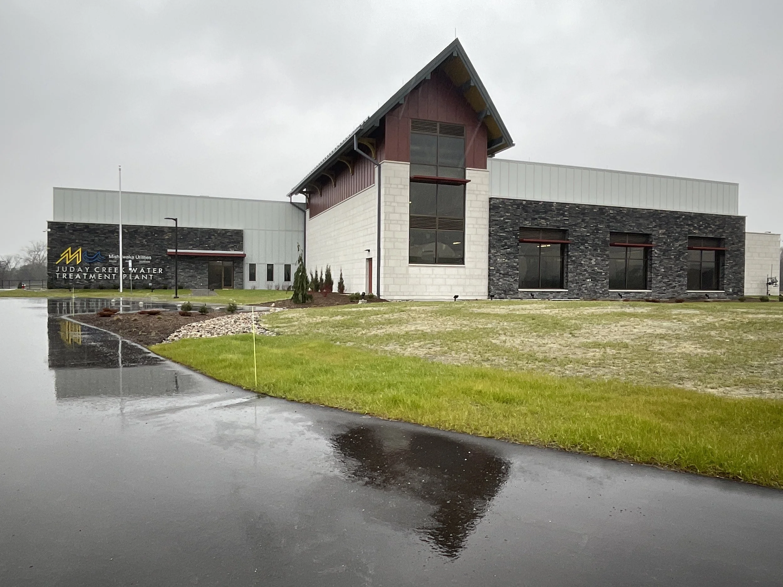 Exterior view of water treatment facility with fabricated metal components.