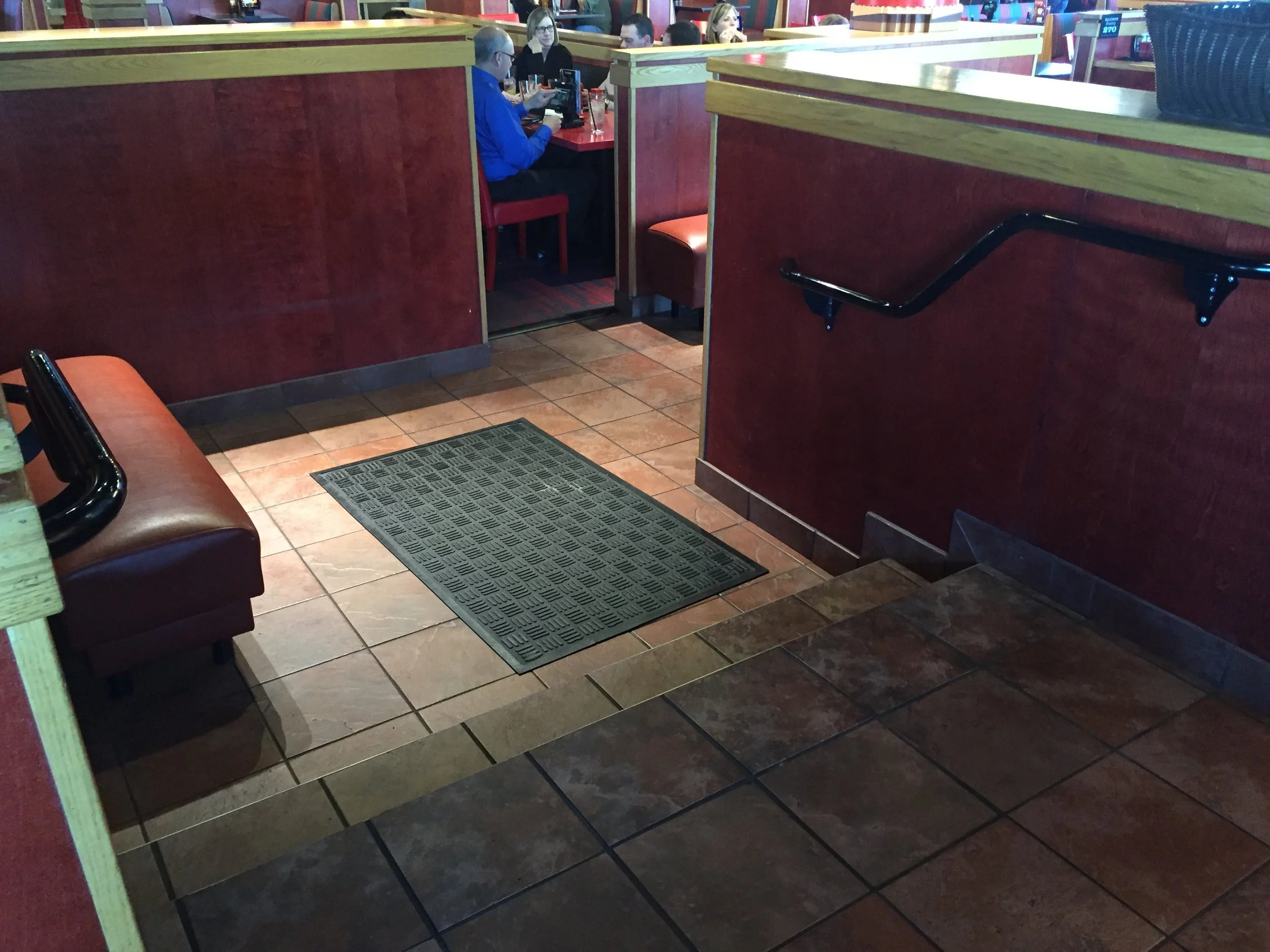 Interior Accessibility Improvements Featuring Continuous Wall-Mounted Handrail Systems.