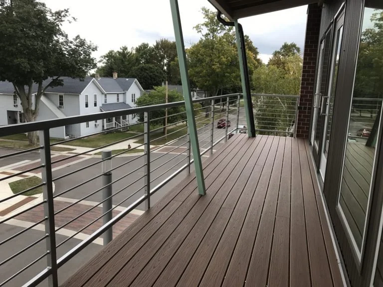 Custom Steel Balcony Railing System with Horizontal Infill Fabricated for Residential Units.