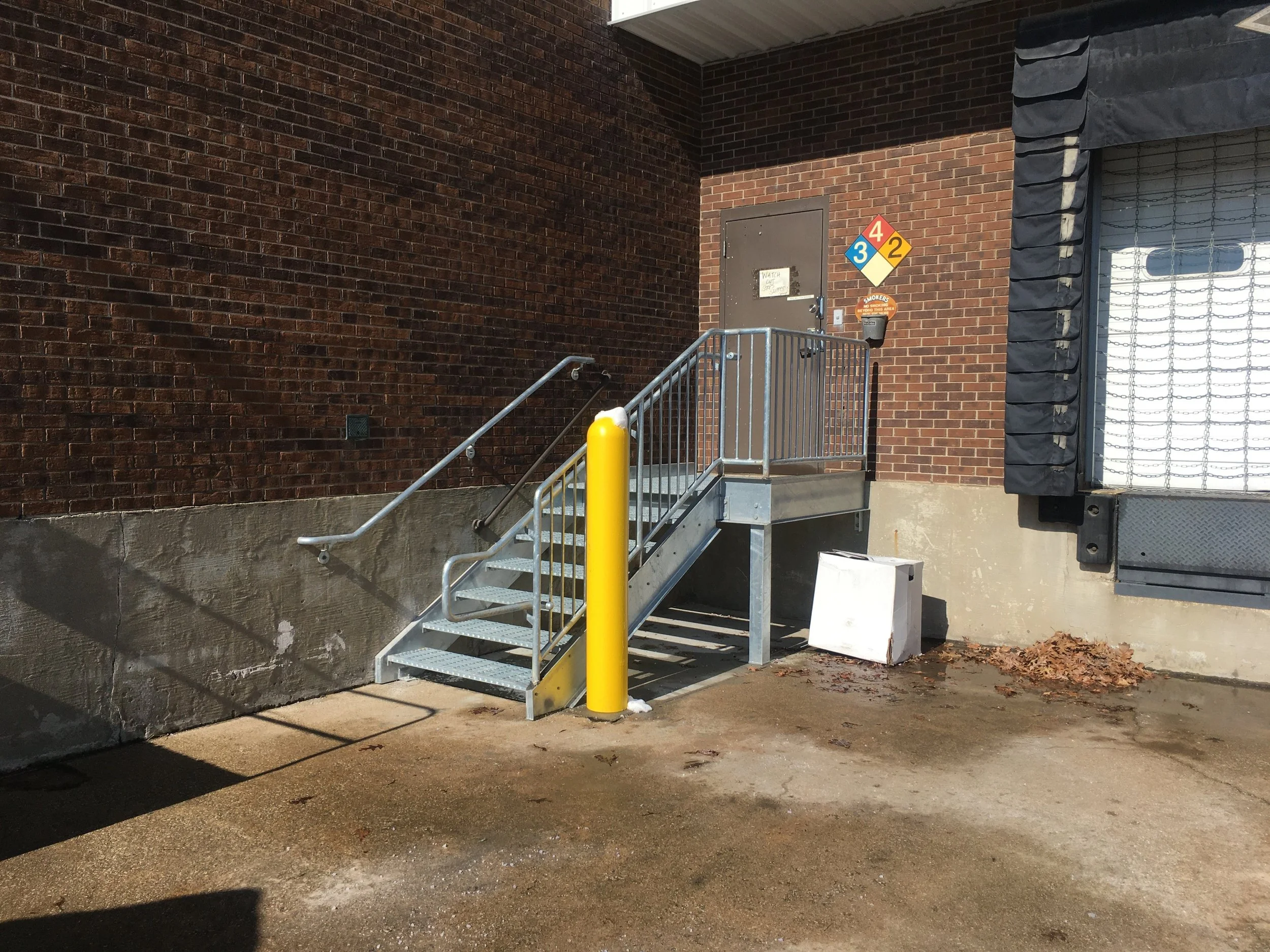 Custom Access Stair and Elevated Platform System Fabricated for Industrial Facility Access.