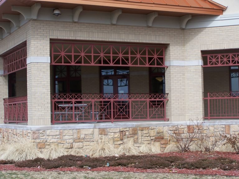 Custom Exterior Steel Balcony Railings with Decorative Cross-Pattern Infill Fabricated for the Olive Township Library.