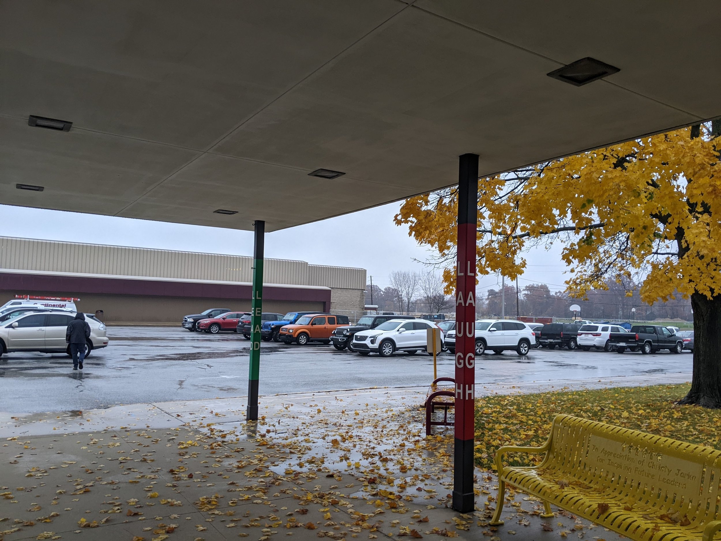 Powder-Coated Steel Columns Featuring School Values Integrated Into the Entrance Design.
