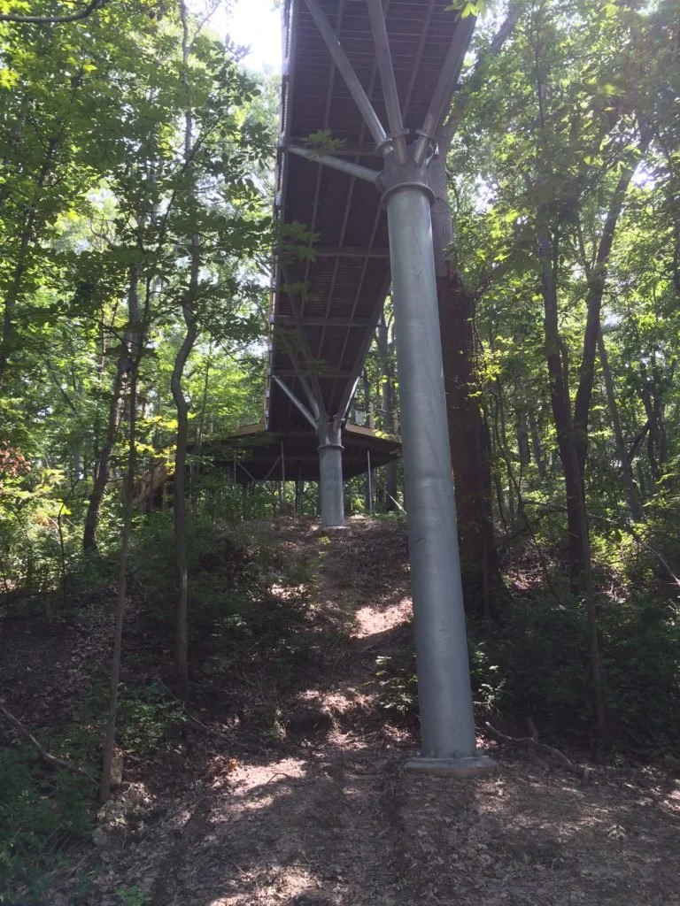Custom Elevated Pedestrian Walkaway Fabricated to Accommodate Site-Specific Terrain Conditions.