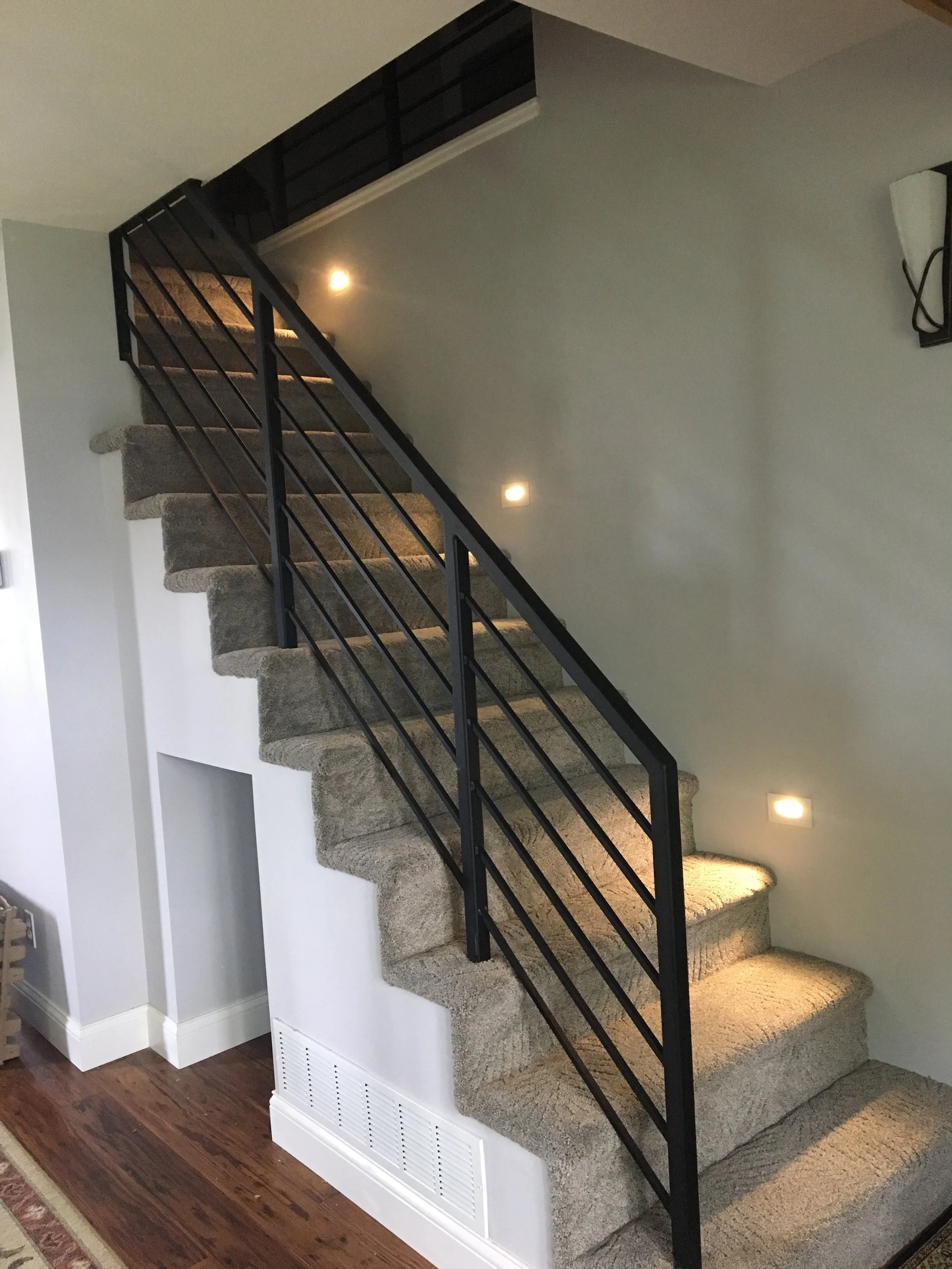 Clean-Lined Steel Railing Designed to Complement the Home's Interior While Enhancing Safety.