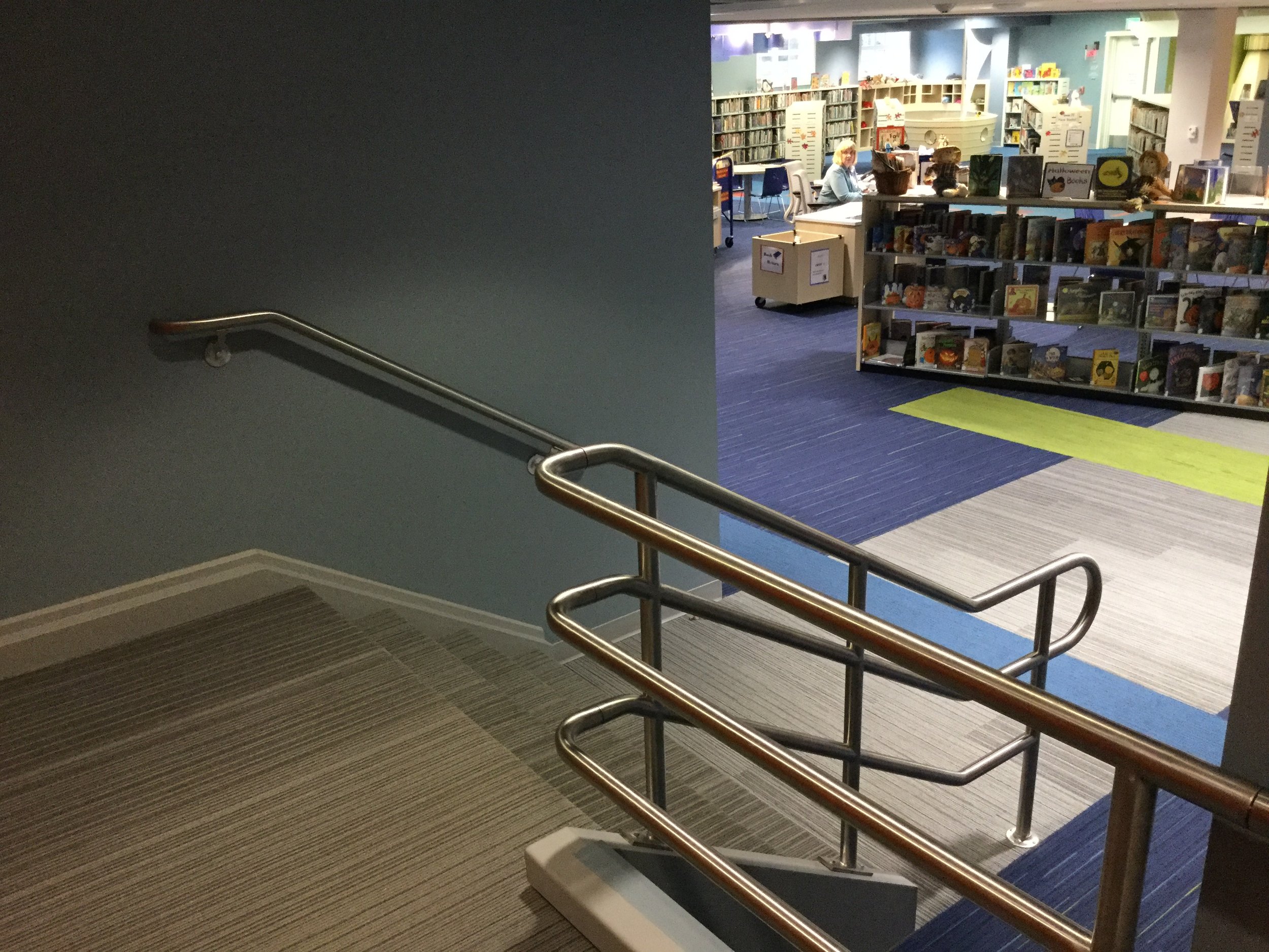 Architectural Handrails Integrated into the Library's Open Interior Layout.