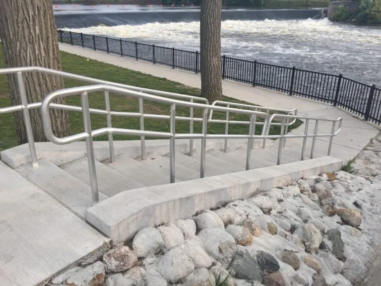 Curved Pedestrian Walkway and Guardrail System Fabricated Along the Mishawaka Riverwalk.