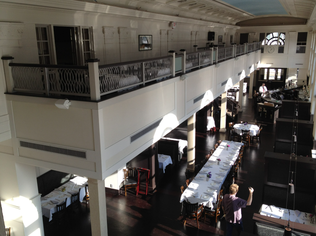 Interior Balcony Railing Overlooking the Main Dining Area at Café Navarre.