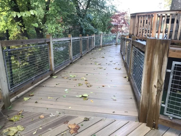 Custom Guardrail Panels Integrated into Elevated Walkway within the Children's Garden.