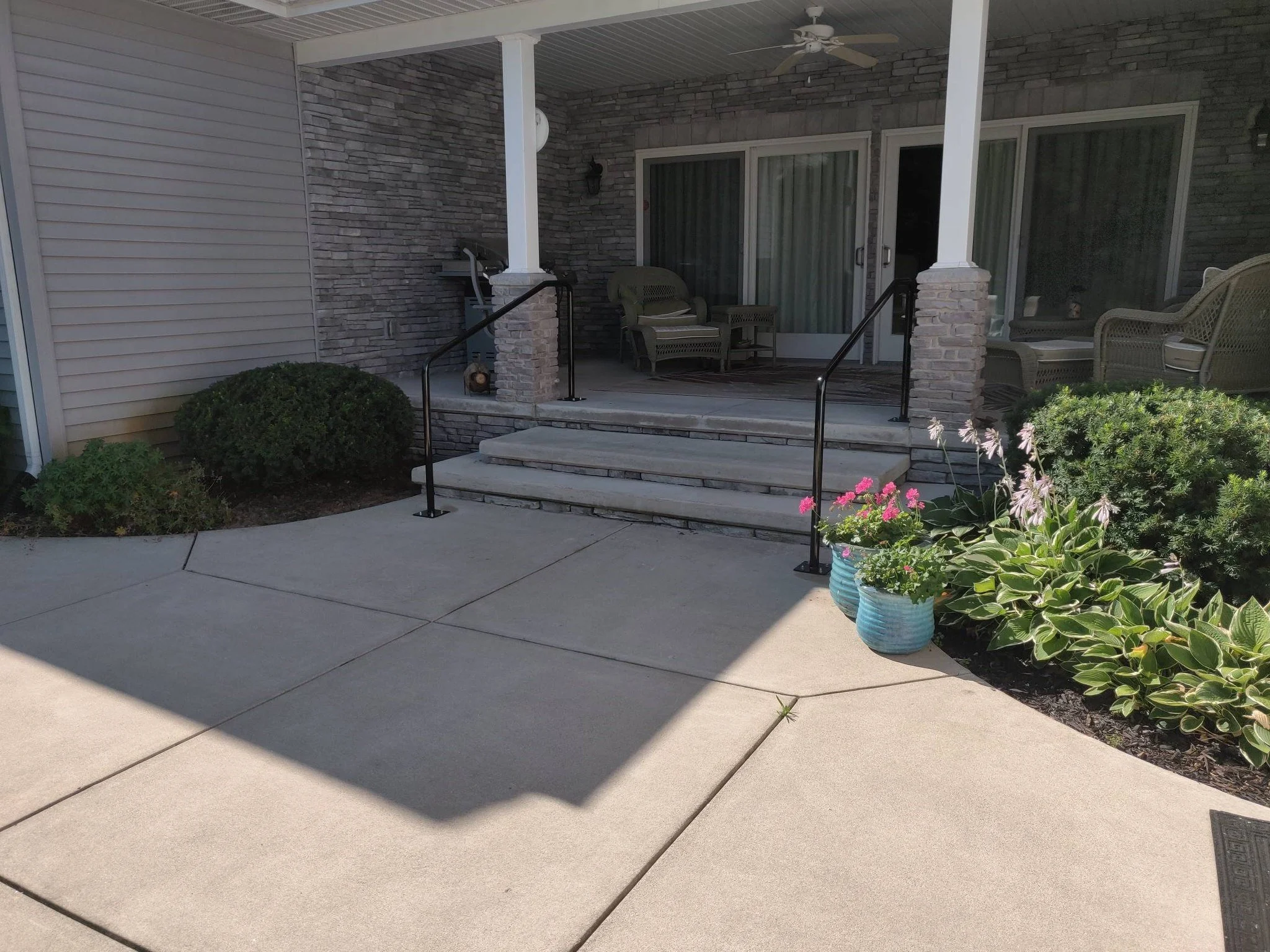 Custom Handrails Installed at Patio Steps.