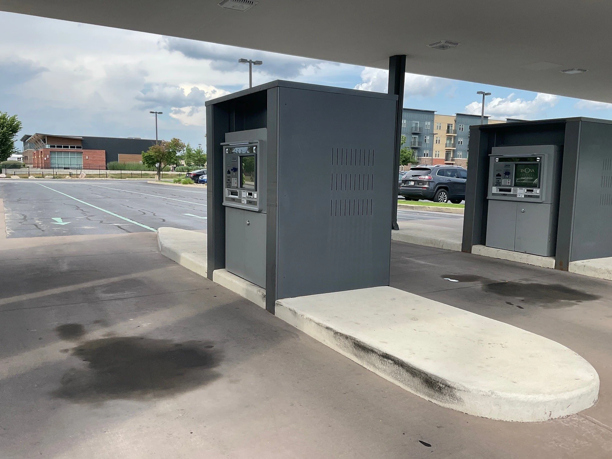 Custom metal ATM cover at a drive-up banking facility