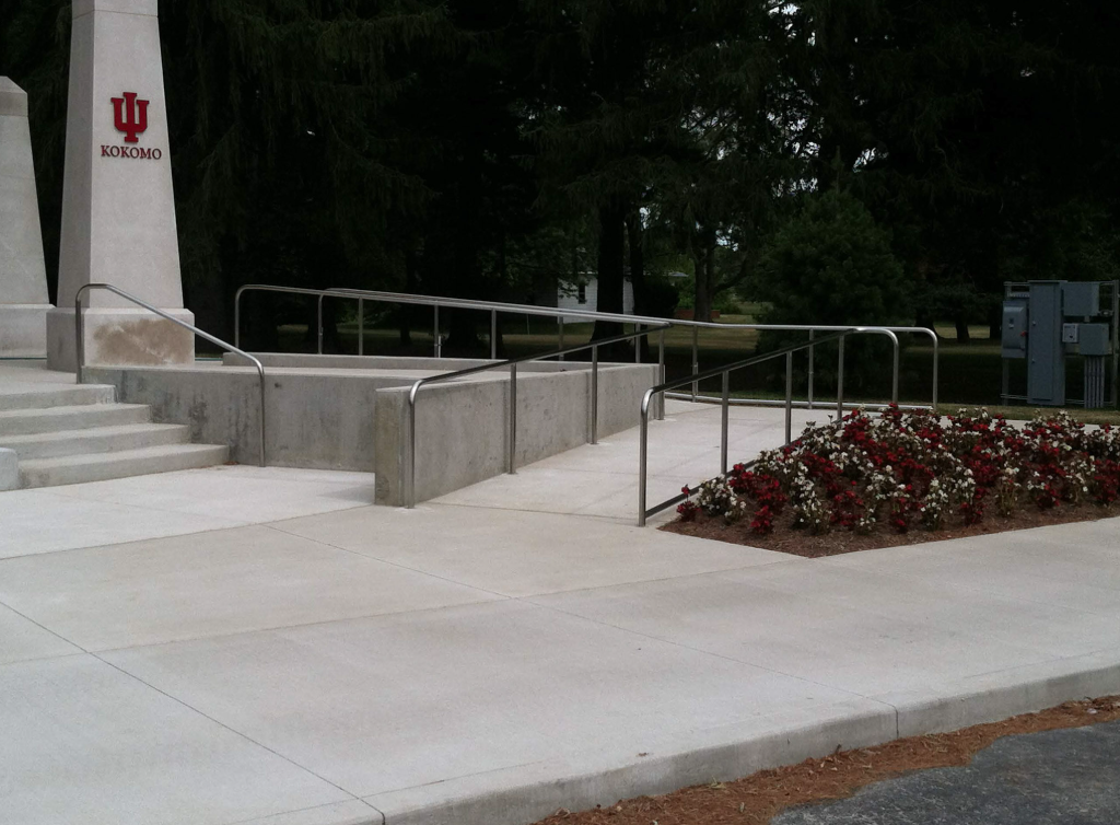 Fabricated steel handrails and guardrails supporting accessible ramps and pedestrian circulation adjacent to the outdoor pavilion at Indiana University Kokomo.