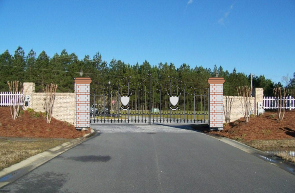 Custom fabricated metal entry gate installed between brick columns.