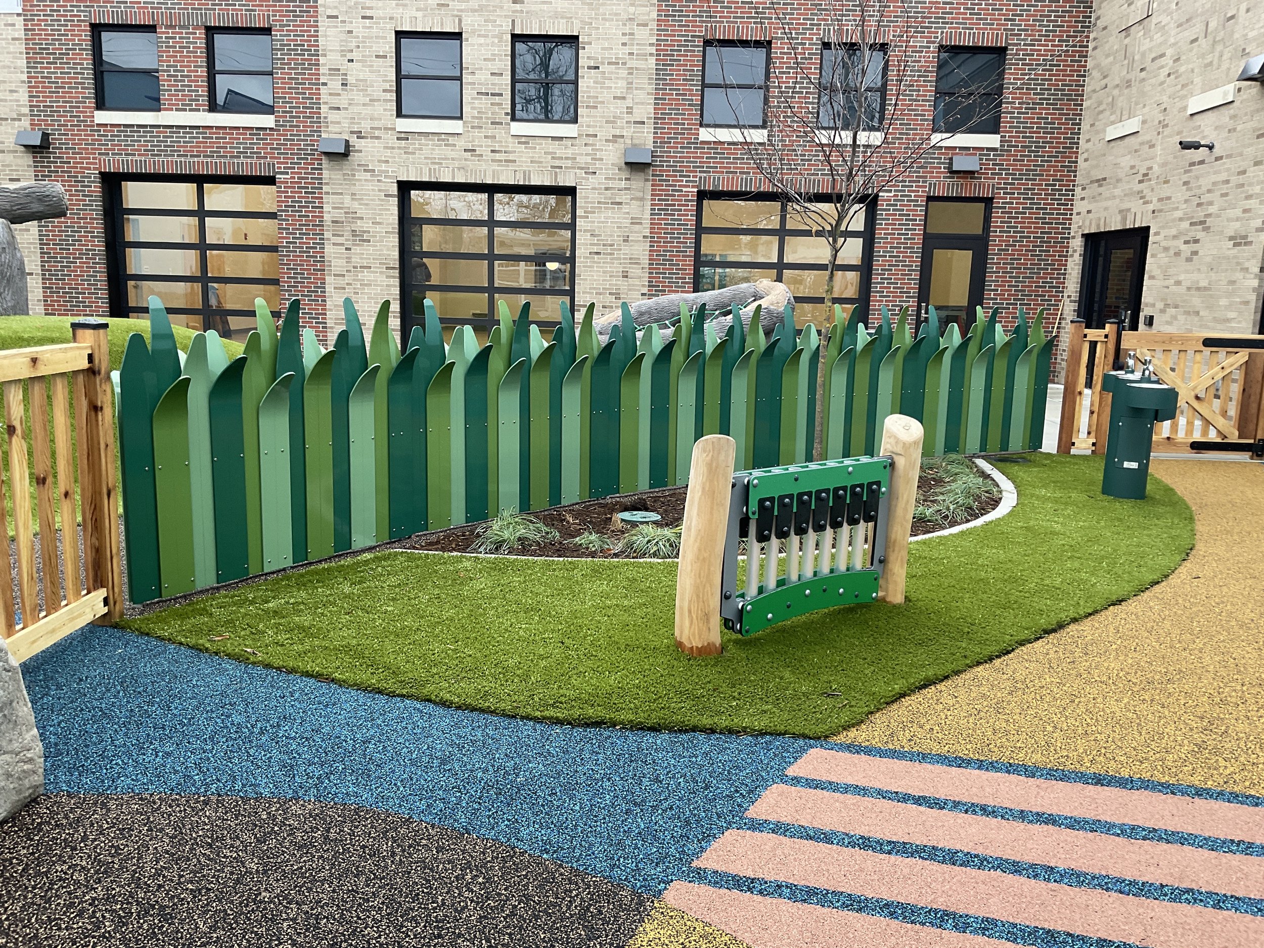 Decorative Metal Playground Fencing Fabricated with Child-Safe Organic Forms.