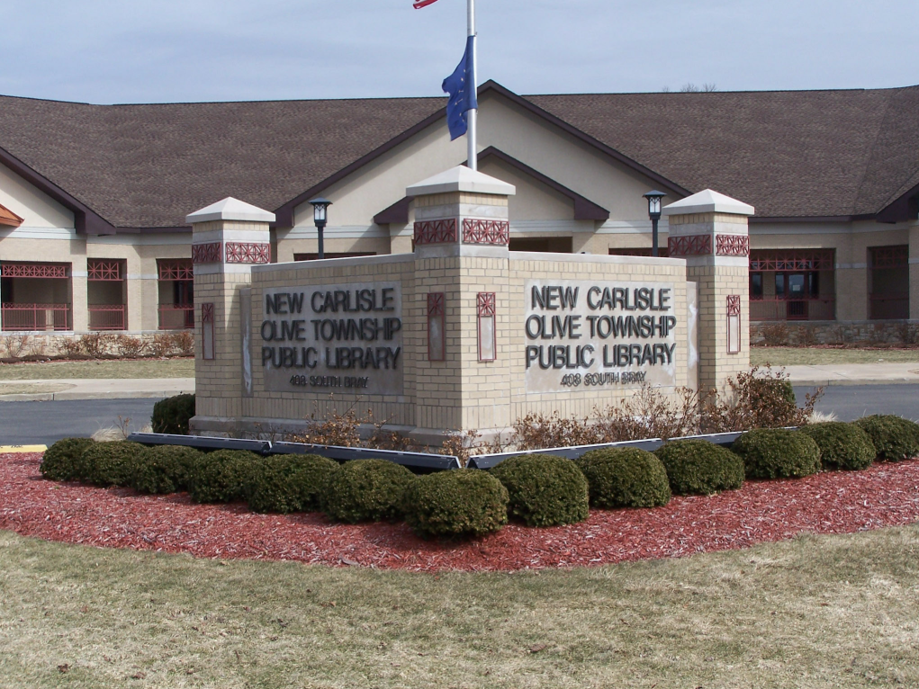Site Monument Sign with Integrated Steel Elements Coordinated with the Olive Township Library’s Exterior Architecture.