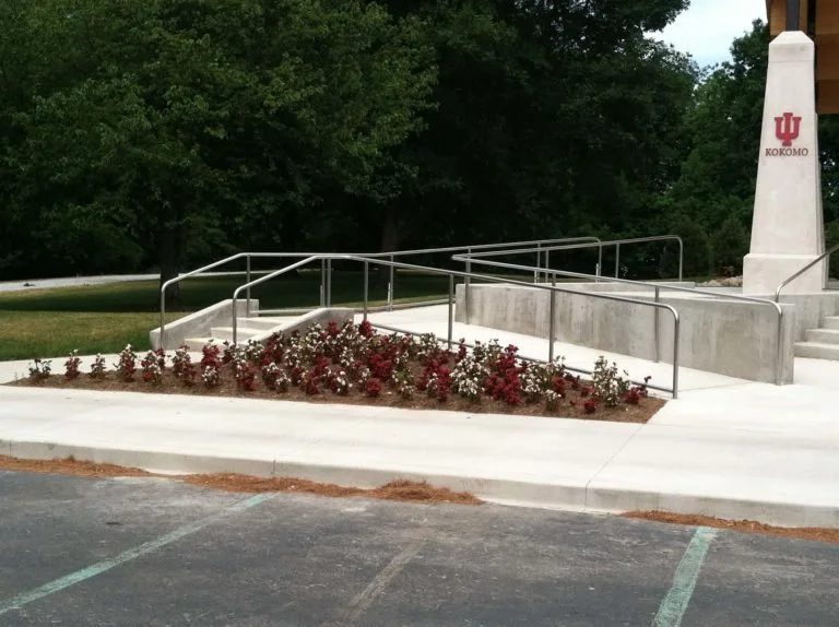 Fabricated Steel Handrails and Guardrails Supporting Accessible Pathways Adjacent to the Pavilion.