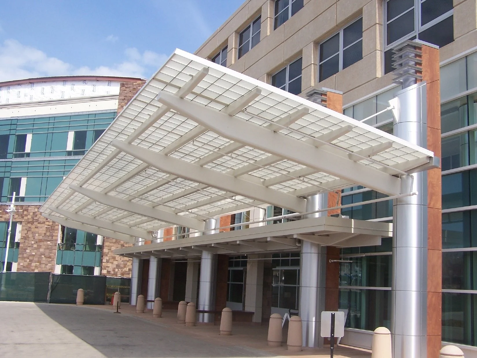 Exterior View of the Hospital Entrance Canopy Showing Steel Framing and Column Supports.