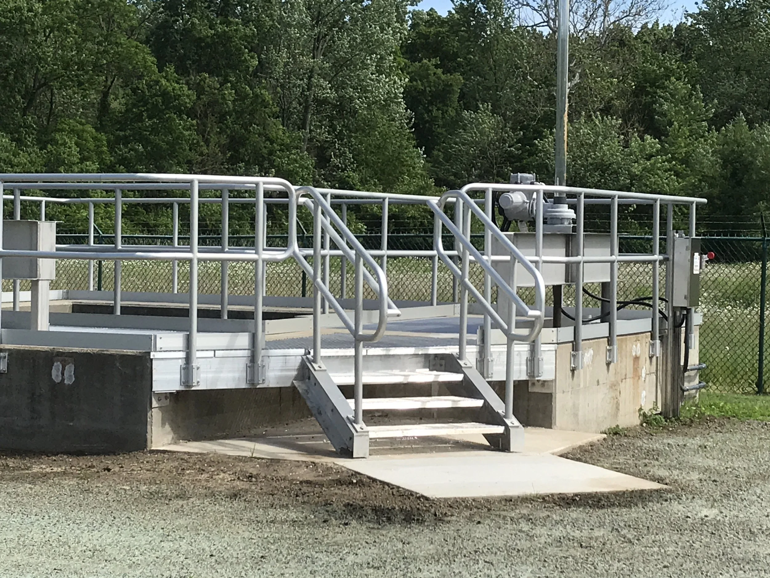 Industrial steel stairs and guardrail system fabricated for water treatment facility.