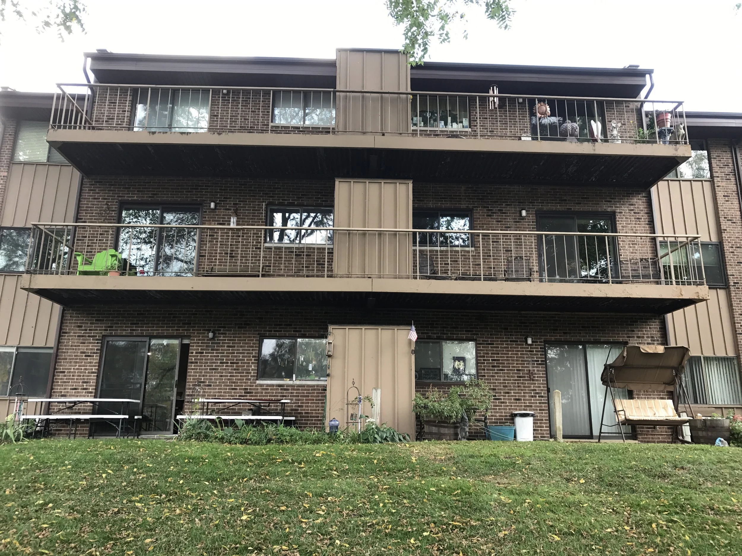 Custom Balcony Guardrail Systems Installed Across Multiple Levels of the Residential Building.