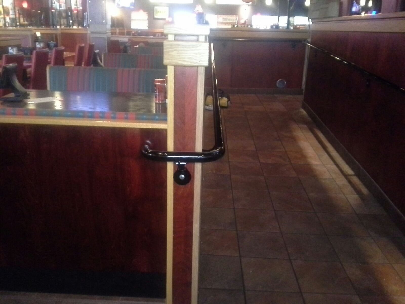 Custom Handrails Providing Safe Access Between Dining Areas and Customer Seating Spaces.