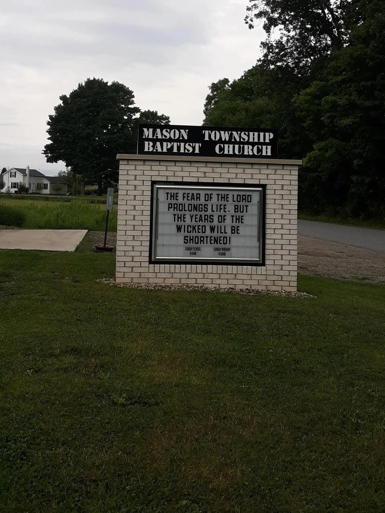 Custom fabricated steel sign structure installed at Mason Township Baptist Church.