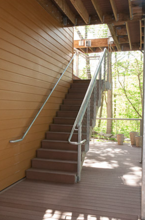 Exterior Stair with Matching Cable Railing System Connecting Deck Levels.
