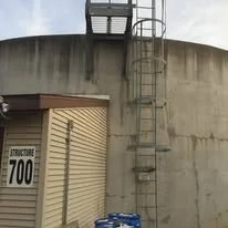 Exterior Steel Ladder and Access Platform Fabricated for Structure 700 at the Elkhart Public Works & Utilities Wastewater Treatment Facility.