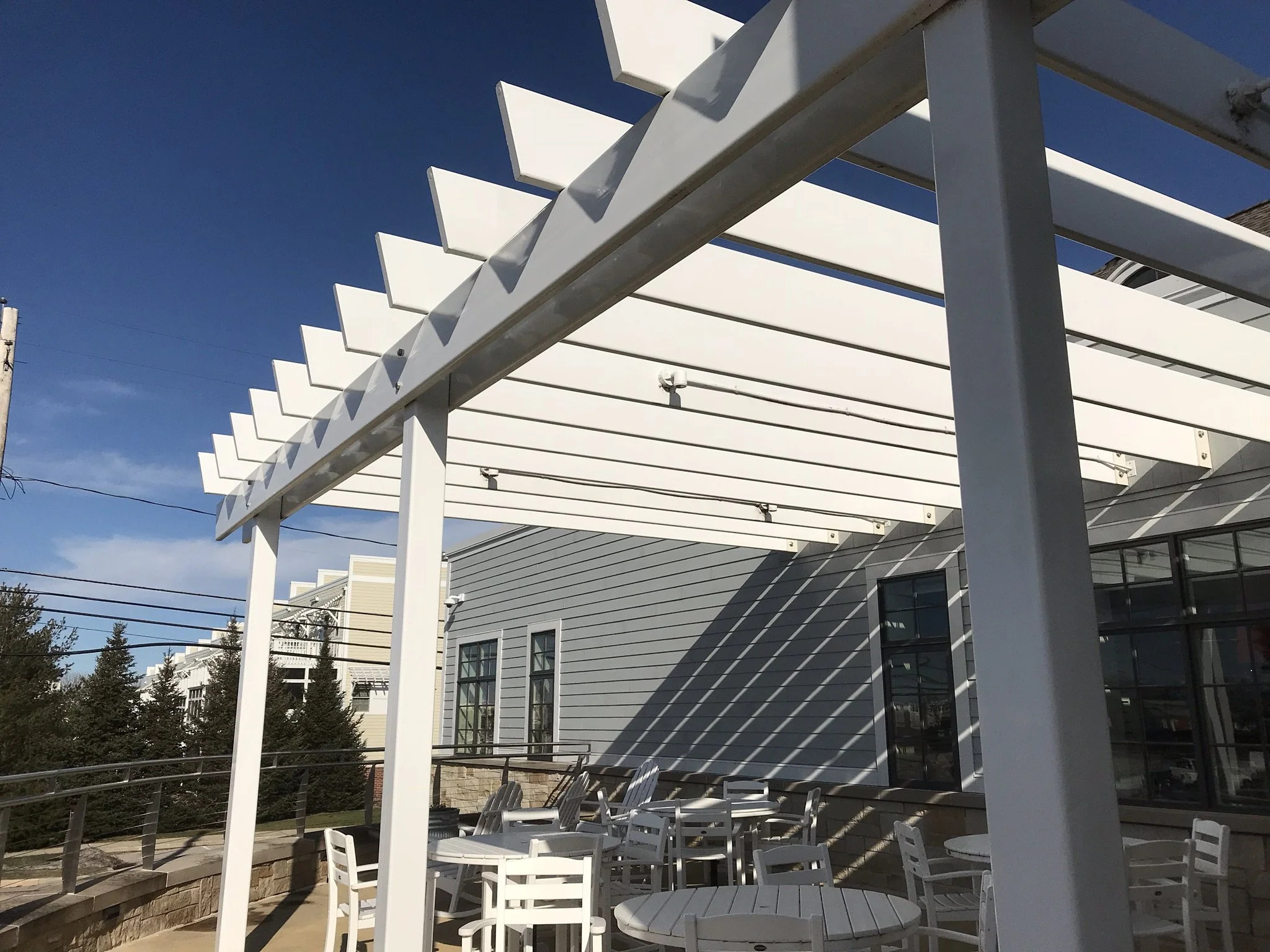Custom Steel Pergola Structure Fabricated for the Library's Outdoor Terrace.