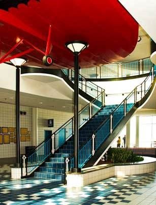 Custom Curved Steel Stair and Railing System Fabricated for Interior Circulation at South Bend International Airport.