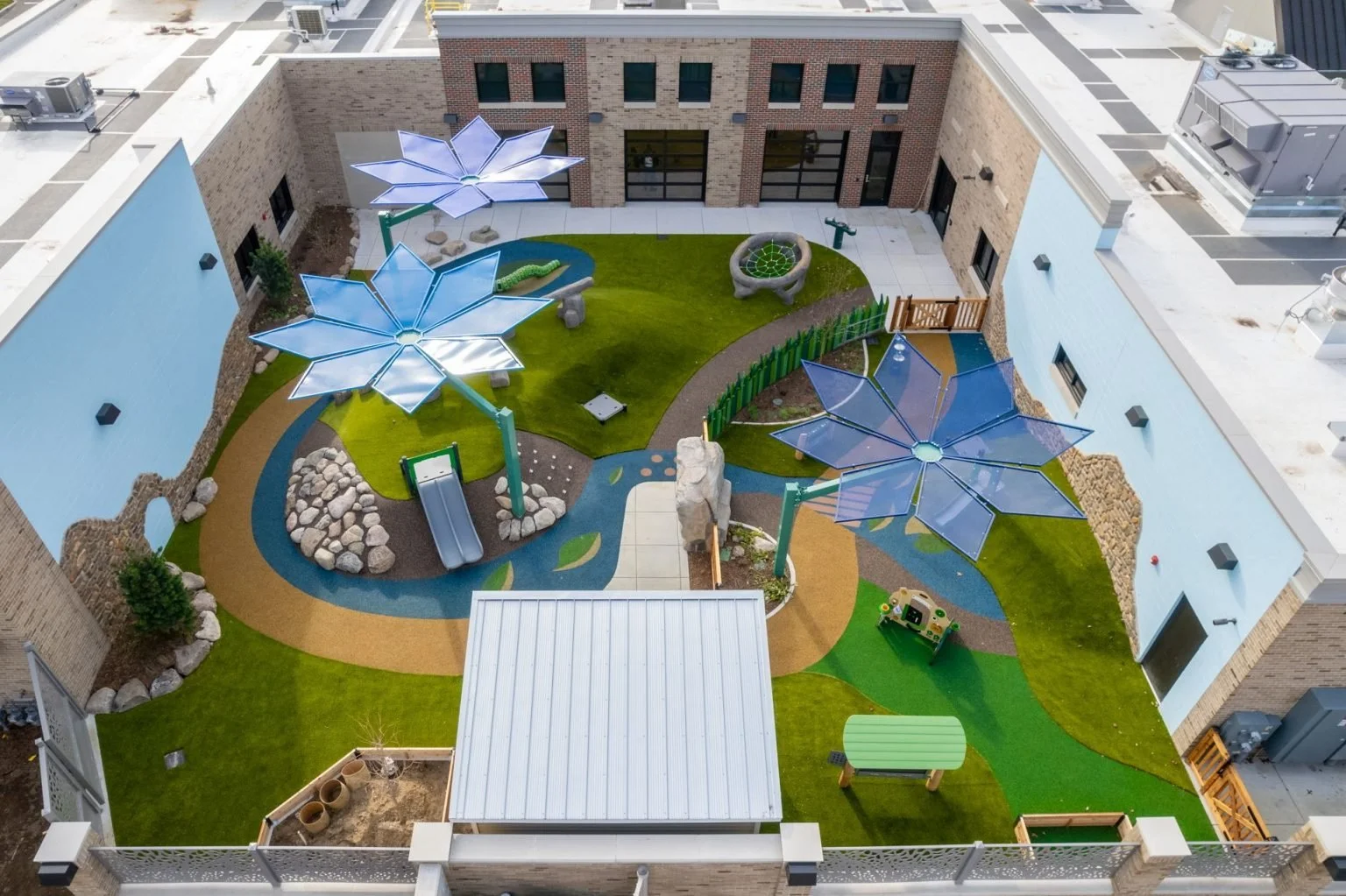 Overview of Completed Playground with Custom Architectural Metal Fencing Systems.